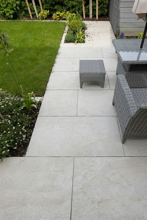 Large outdoor tiles laid as a garden path