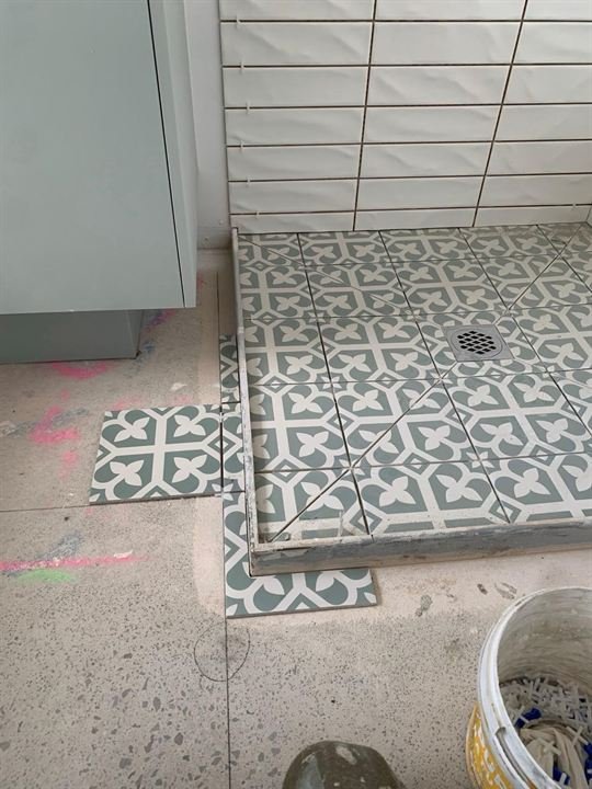 Patterned tiles on a shower floor